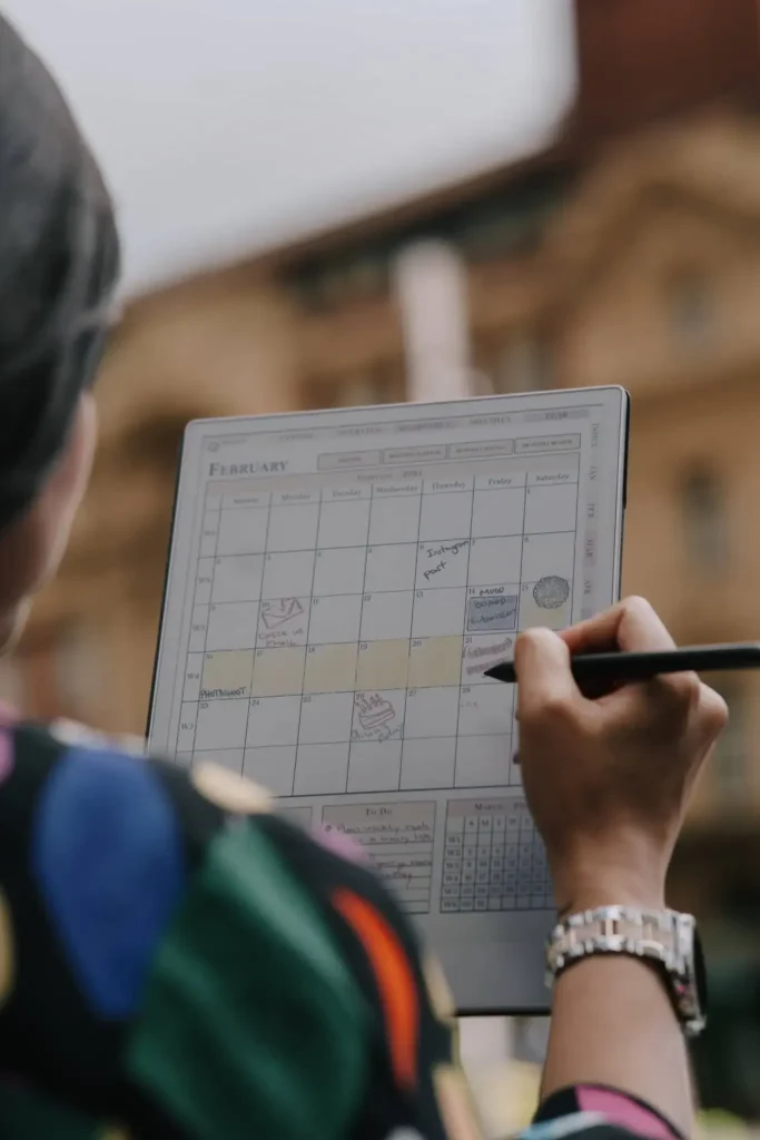 Girl Working on Digital Planner Calendar